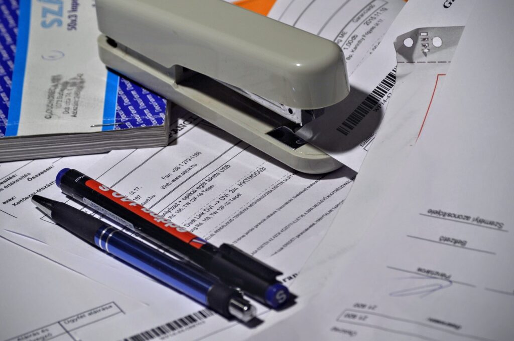 stapler, pen, paperwork-1016310.jpg